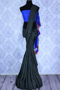 Buy black muga Banarasi sari online in USA with blue pallu. The beautiful saree is a great choice for a classic Indian saree look at special occasions. Select from an exquisite collection of traditional Indian Banarasi sarees, silk saris at Pure Elegance clothing store or shop online for weddings, parties, and festivals.-full view