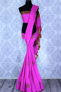 Buy elegant pink muga Banarasi saree online in USA with buta. The striking saree is a great choice to keep it simple and ethnic at special occasions. Select from an exquisite collection of traditional Indian Banarasi sarees at Pure Elegance clothing store or shop online for occasions like weddings, parties, and festivals.-full view