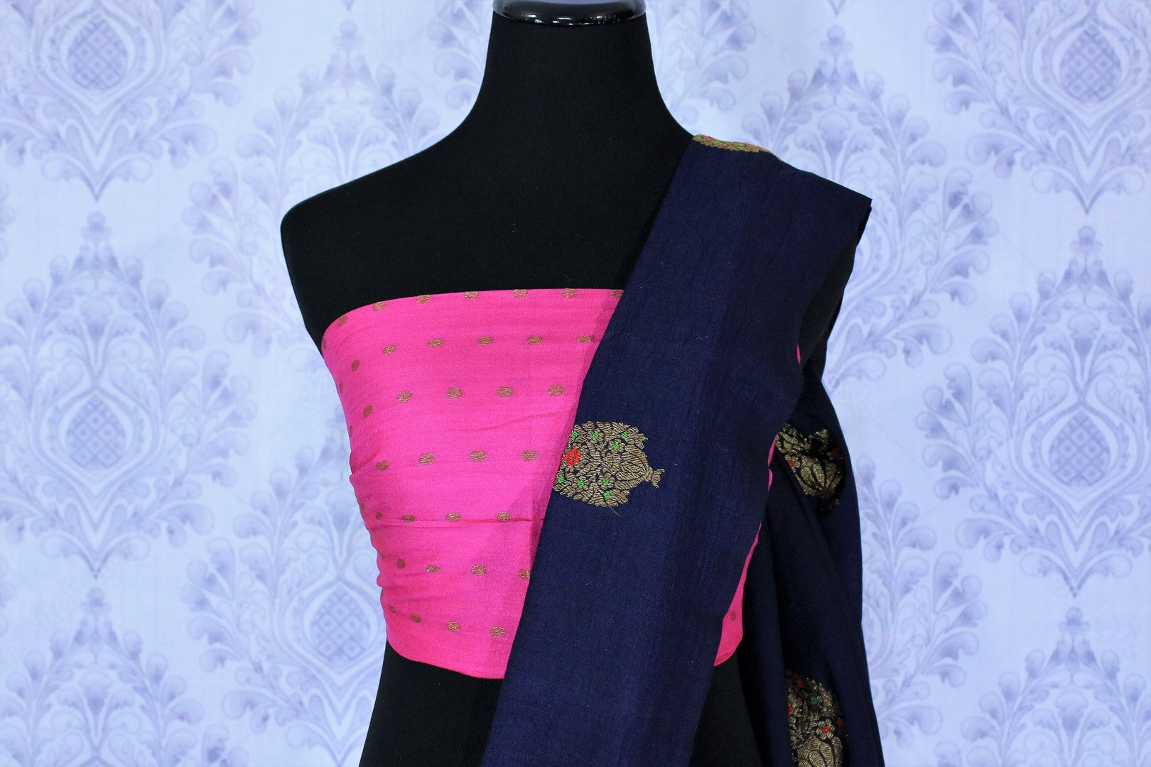 Dress up for weddings and special events in this royal blue designer muga banarsi silk sari with a stunning zari work. Style this glorious saree with a contrasting pink blouse complemented with a pink border on the heavily embroidered pallu to turn heads. Shop designer sarees online or visit Pure Elegance store in USA.-blouse pallu