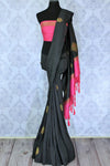 Slay effortlessly in this designer black muga banarsi silk designer sari with a gorgeous blend of zari embroidery. Style this astonishing saree with a contrasting pink zari silk blouse complemented with a rich embroidered pallu. Shop designer silk sarees online or visit Pure Elegance store in USA.-full view