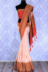 Don the beautiful peach zari embroidery silk saree with the red silk designer blouse. Elevate your style game with this floral embroidered silk sari complemented with a deep red rich pallu to feel the authenticity. Shop such designer silk sarees printed saris, cikkat saris online or visit Pure Elegance store in USA. -full view