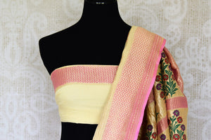 Embrace elegance in this yellow georgette banarsi silk sari. It comes with a handwoven design on the sari with beautiful zari work on border. The pallu features rich heavily floral work embroidered with precision. Shop such handcrafted silk sarees, linen sari, chiffon saree online or visit Pure Elegance store, USA. -blouse pallu
