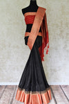 Buy black tussar Benarasi sari online in USA with red zari border and pallu. Make an elegant ethnic fashion statement at parties, weddings and special occasions with a splendid collection of Indian designer sarees, Banarasi saris, handloom saris from Pure Elegance Indian clothing store in USA or shop online.-full view