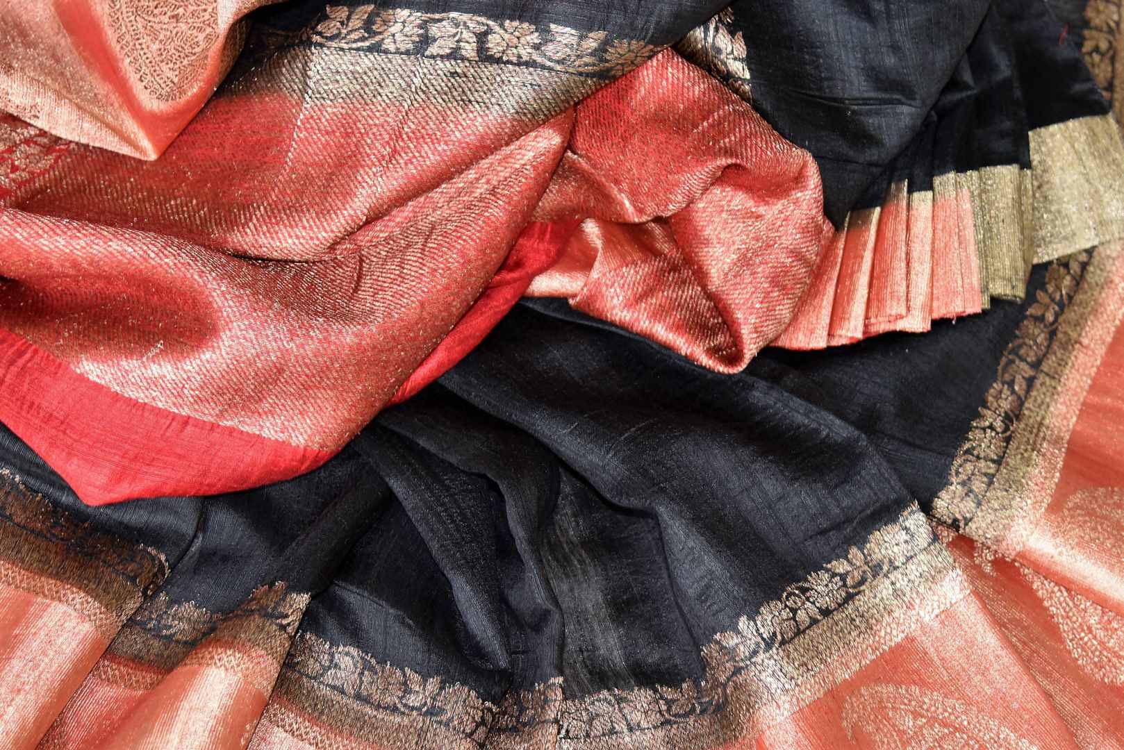Buy black tussar Benarasi sari online in USA with red zari border and pallu. Make an elegant ethnic fashion statement at parties, weddings and special occasions with a splendid collection of Indian designer sarees, Banarasi saris, handloom saris from Pure Elegance Indian clothing store in USA or shop online.-details