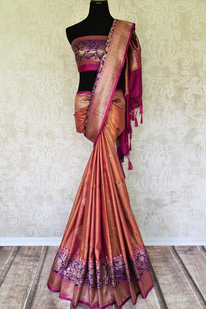 Ace your uber-style in this pink tussar banarsi silk sari. Style it with a designer blouse and intricate buta work all-over the beautiful saree. The rich gold zari border saree that comes with a breath-taking contrast. Shop handloom sarees, banarsi silk sari, chiffon saree online or visit Pure Elegance store, USA. -full view