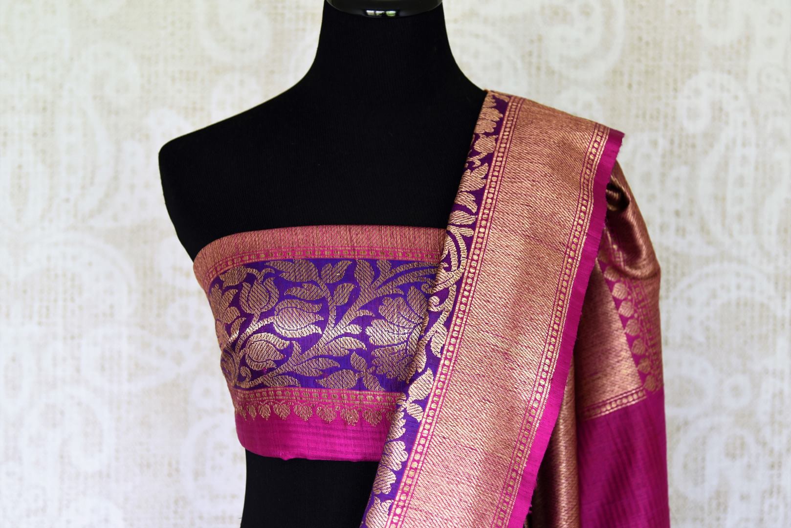 Ace your uber-style in this pink tussar banarsi silk sari. Style it with a designer blouse and intricate buta work all-over the beautiful saree. The rich gold zari border saree that comes with a breath-taking contrast. Shop handloom sarees, banarsi silk sari, chiffon saree online or visit Pure Elegance store, USA. -blouse pallu
