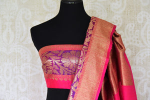 Drape the authenticity of this orange tussar silk banarsi saree with intricate buta work. The zari work on the border and heavily woven pallu enhances the beauty. Style this saree with a designer blouse in contrasting weaves. Shop handcrafted banarsi silk sari, linen saree, online or visit Pure Elegance store, USA. -blouse pallu