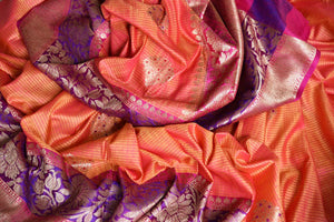 Drape the authenticity of this orange tussar silk banarsi saree with intricate buta work. The zari work on the border and heavily woven pallu enhances the beauty. Style this saree with a designer blouse in contrasting weaves. Shop handcrafted banarsi silk sari, linen saree, online or visit Pure Elegance store, USA. -details