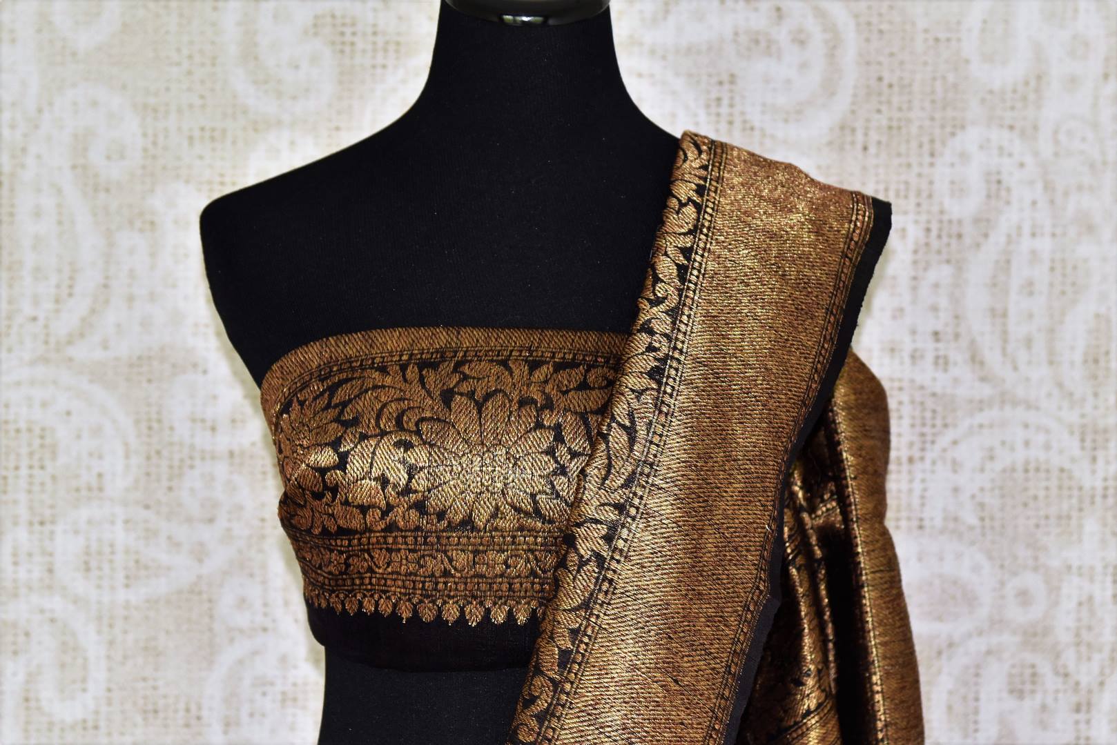 Channel sophistication in grey matka banarsi silk saree. A perfect pick for festivities and formal events, style this saree with a contrasting black and gold zari woven blouse. The gold zari border flows throughout the sari. Shop banarsi silk sarees, linen sari, georgette saree online or visit Pure Elegance store, USA.-blouse pallu