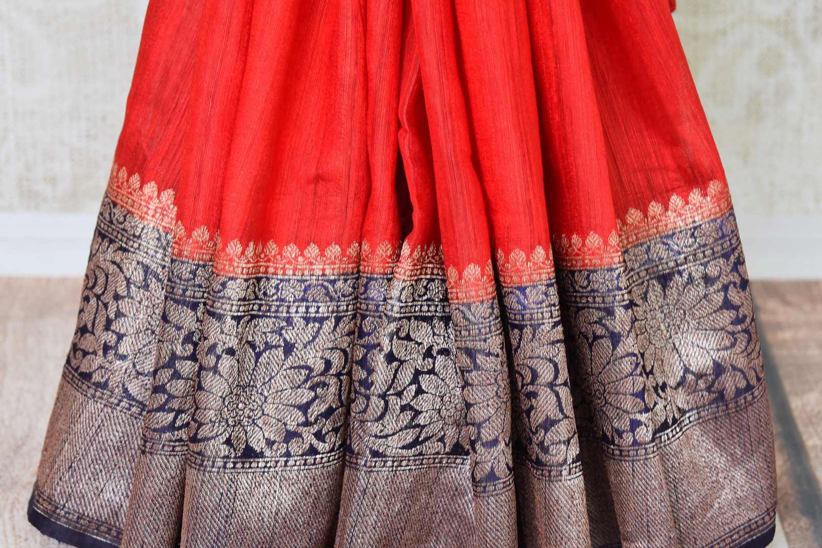 Enchanting hues of red matka banarsi silk are here to melt your heart this wedding season. Drape this sari with a gold and black intricately woven zari border and compliment it with a similar designer blouse. Shop handloom sarees, silk sari, linen saree online or visit Pure Elegance store, USA.-pleats