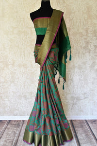 Buy green floral tussar Banarasi saree with zari border online in USA. Adorn yourself in glorious Indian sarees from Pure Elegance Indian clothing store in USA. We have an exclusive range of Indian designer sarees, traditional handloom saris, Banarasi sarees to make your Indian look absolutely captivating.-full view