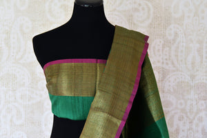 Buy green floral tussar Banarasi saree with zari border online in USA. Adorn yourself in glorious Indian sarees from Pure Elegance Indian clothing store in USA. We have an exclusive range of Indian designer sarees, traditional handloom saris, Banarasi sarees to make your Indian look absolutely captivating.-blouse pallu