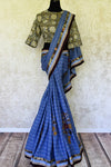 Buy blue linen sari with saree blouse online in USA and Kalamkari applique. Add tasteful Indian woven saris to your ethnic wardrobe from Pure Elegance Indian fashion store in USA. We have an exclusive range of Indian designer sarees, wedding saris, handloom sarees to make your Indian look absolutely captivating.-full view