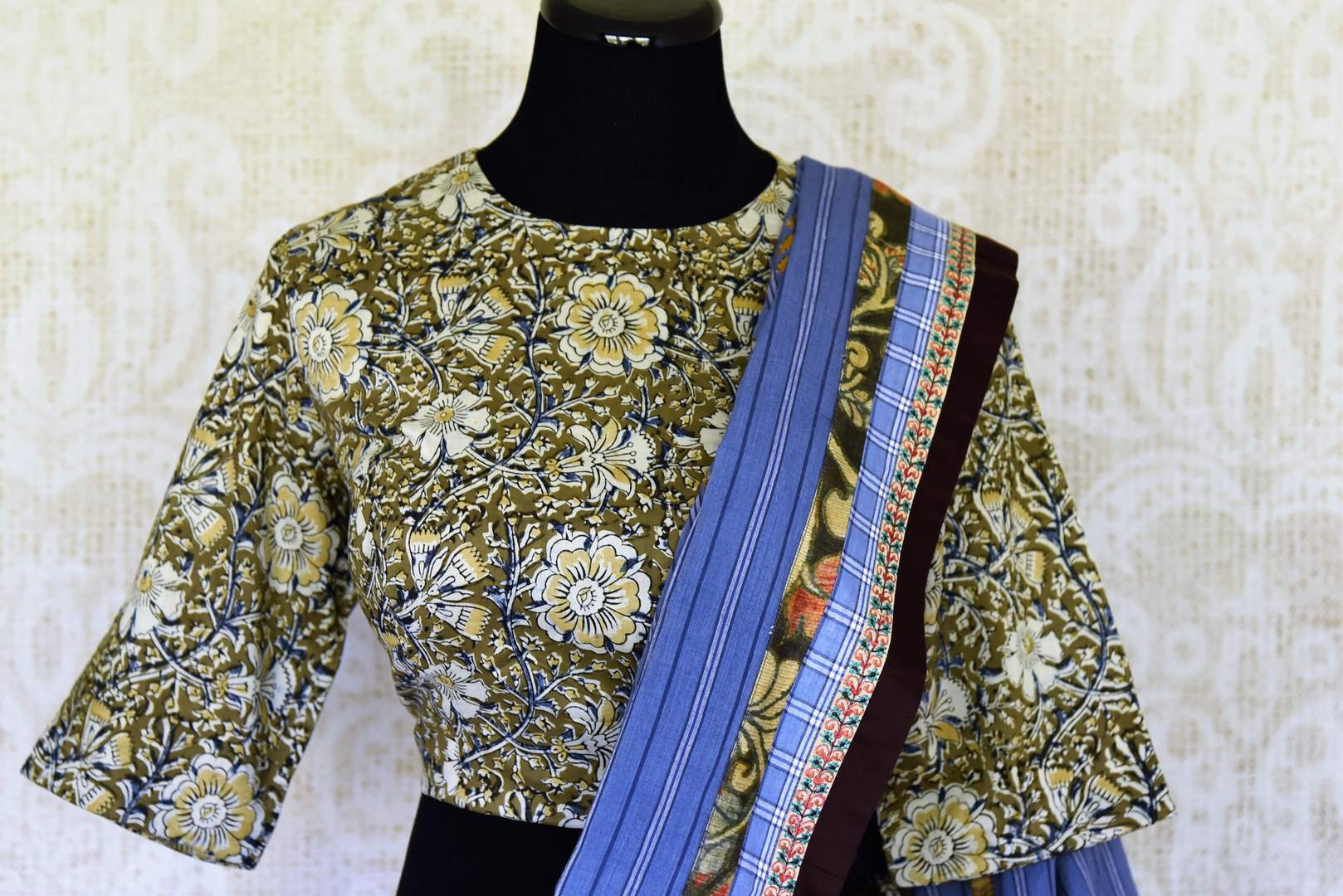 Buy blue linen sari with saree blouse online in USA and Kalamkari applique. Add tasteful Indian woven saris to your ethnic wardrobe from Pure Elegance Indian fashion store in USA. We have an exclusive range of Indian designer sarees, wedding saris, handloom sarees to make your Indian look absolutely captivating.-blouse pallu