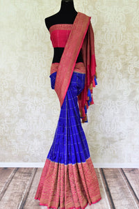Shop striking blue color check muga silk saree online in USA with antique zari border. Find a range of Indian handloom saris at Pure Elegance clothing store in USA. Elevate your traditional style with a range of Indian clothing, designer silk sarees, Banarasi sarees, and much more also available at our online store.-full view