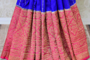 Shop striking blue color check muga silk saree online in USA with antique zari border. Find a range of Indian handloom saris at Pure Elegance clothing store in USA. Elevate your traditional style with a range of Indian clothing, designer silk sarees, Banarasi sarees, and much more also available at our online store.-pleats