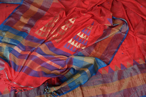Shop red linen saree online in USA with purple border from Pure Elegance online store. Visit our exclusive Indian clothing store in USA and get floored by a range of exquisite Indian sarees, handloom sarees, silk sarees, Indian jewelry and much more to complete your ethnic look.-details