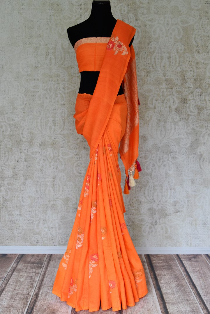 Shop beautiful orange muga Banarasi saree online in USA with floral buta from Pure Elegance online store. Visit our exclusive Indian clothing store in USA and get floored by a range of exquisite Indian Kanjivaram saris, Banarasi sarees, silk sarees, Indian jewelry and much more to complete your ethnic look.-full view