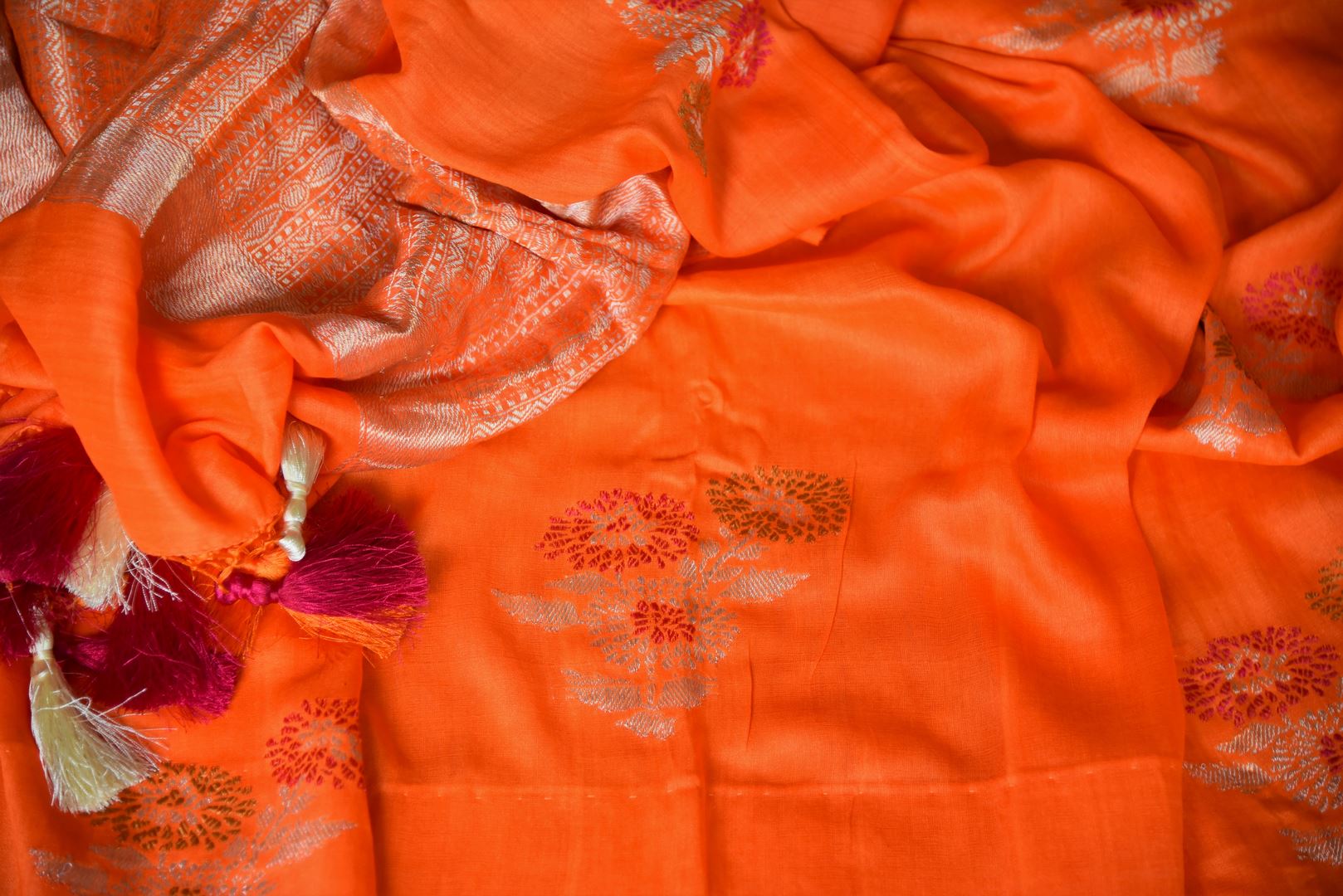 Shop beautiful orange muga Banarasi saree online in USA with floral buta from Pure Elegance online store. Visit our exclusive Indian clothing store in USA and get floored by a range of exquisite Indian Kanjivaram saris, Banarasi sarees, silk sarees, Indian jewelry and much more to complete your ethnic look.-details