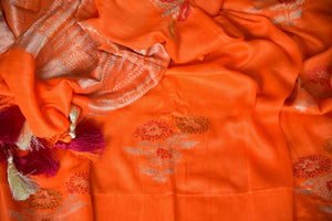Shop beautiful orange muga Banarasi saree online in USA with floral buta from Pure Elegance online store. Visit our exclusive Indian clothing store in USA and get floored by a range of exquisite Indian Kanjivaram saris, Banarasi sarees, silk sarees, Indian jewelry and much more to complete your ethnic look.-details