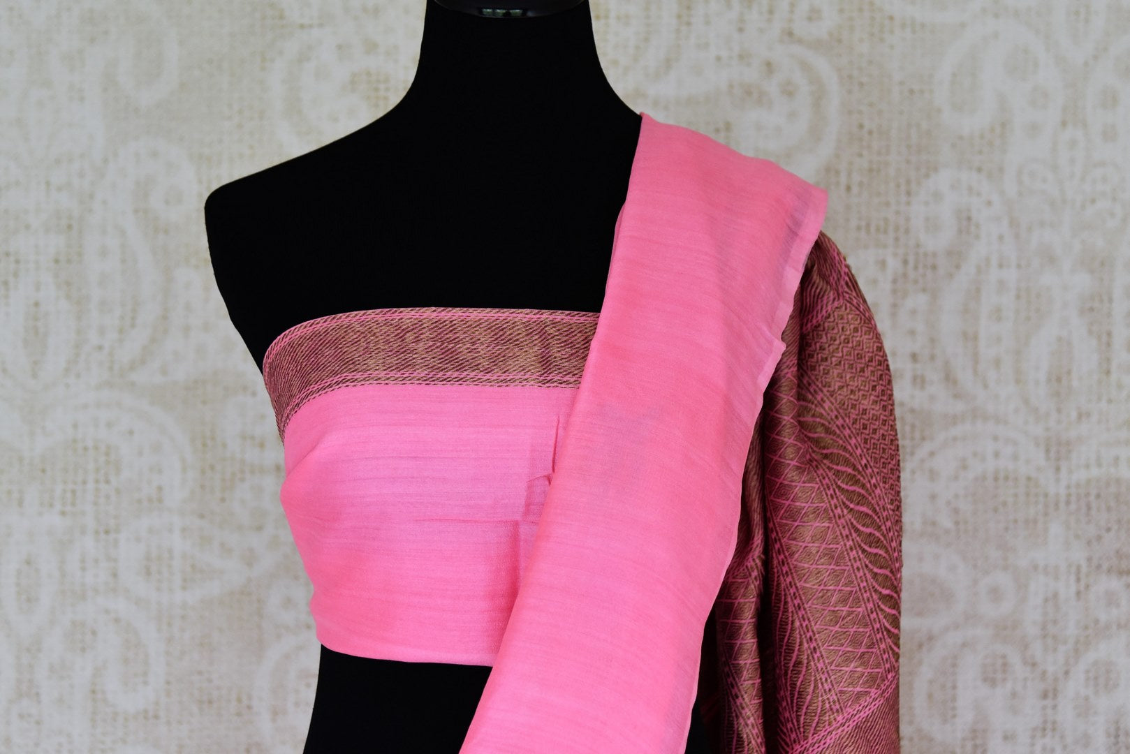 Shop woven pink color muga Banarasi saree online in USA with floral buta from Pure Elegance online store. Visit our exclusive Indian clothing store in USA and get floored by a range of exquisite Indian Kanjivaram saris, Banarasi sarees, silk sarees, Indian jewelry and much more to complete your ethnic look.-blouse pallu
