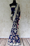 Buy dark blue georgette Benarasi saree online in USA with overall floral zari jaal from Pure Elegance online store. Visit our exclusive Indian clothing store in USA and get floored by a range of exquisite pure handloom sarees, Banarasi sarees, silk sarees, Indian jewelry and much more to complete your ethnic look.-full view
