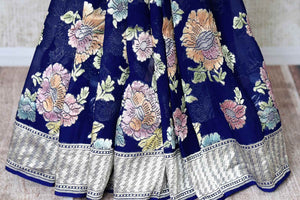 Buy dark blue georgette Benarasi saree online in USA with overall floral zari jaal from Pure Elegance online store. Visit our exclusive Indian clothing store in USA and get floored by a range of exquisite pure handloom sarees, Banarasi sarees, silk sarees, Indian jewelry and much more to complete your ethnic look.-pleats