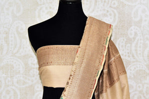 Buy beige muga Banarasi saree online in USA with zari and minakari work from Pure Elegance online store. Visit our exclusive Indian clothing store in USA and get floored by a range of exquisite pure handloom sarees, Banarasi sarees, silk sarees, Indian jewelry and much more to complete your ethnic look.-blouse pallu