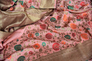 Shop pink color muga Banarasi sari online in USA with floral zari and minakari work from Pure Elegance online store. Visit our exclusive Indian clothing store in USA and get floored by a range of exquisite pure handloom sarees, Banarasi sarees, silk sarees, Indian jewelry and much more to complete your ethnic look.-details