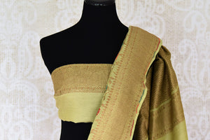 Shop green color muga Banarasi saree online in USA with floral zari and minakari work from Pure Elegance online store. Visit our exclusive Indian clothing store in USA and get floored by a range of exquisite pure handloom sarees, Banarasi sarees, silk sarees, Indian jewelry and much more to complete your ethnic look.-blouse pallu