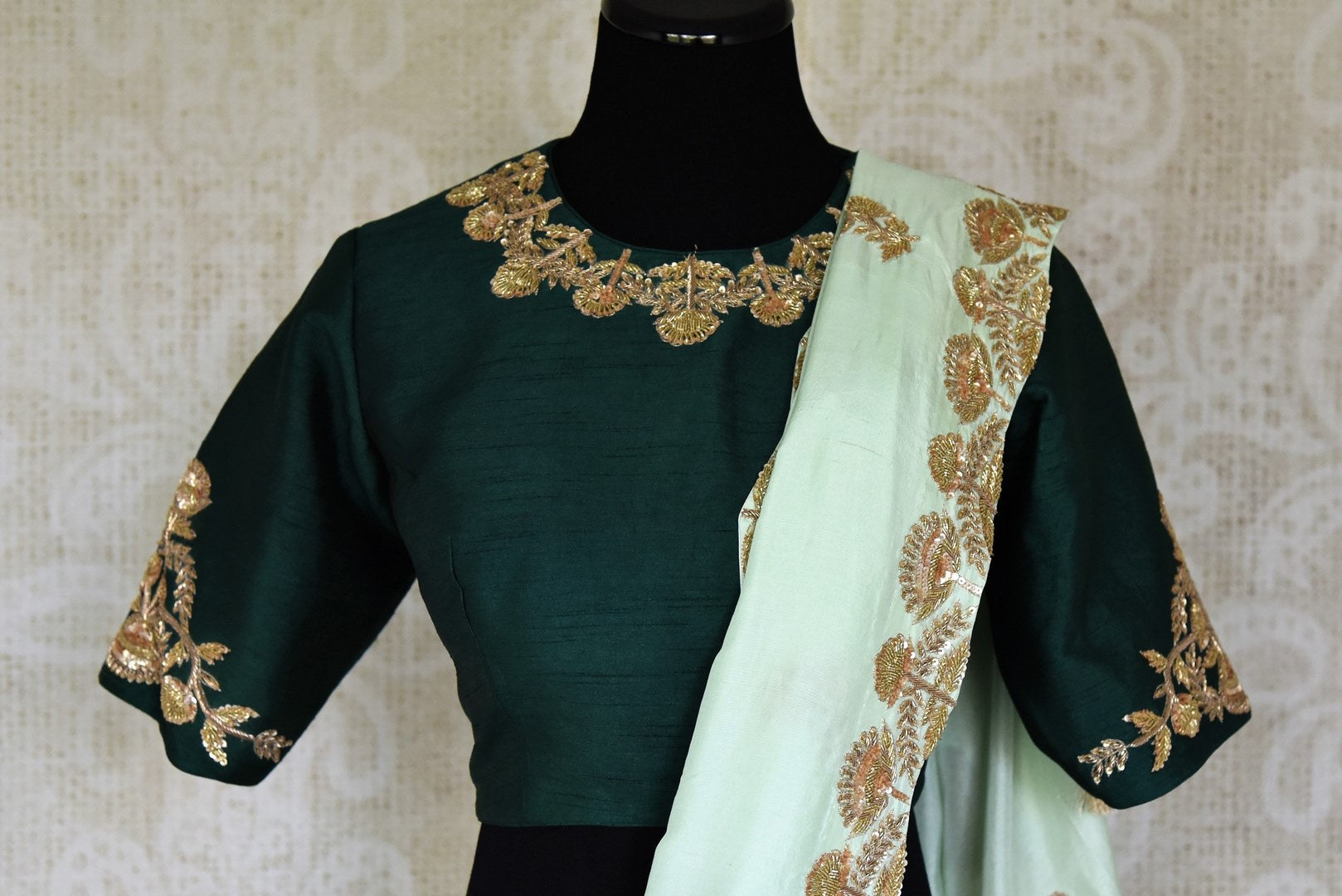 Buy pastel green hand embroidered sari with embroidered saree blouse online in USA from Pure Elegance. Be an epitome of Indian fashion on special occasions with beautiful designer sarees, Banarasi sarees available at our Indian fashion store in USA. -blouse pallu