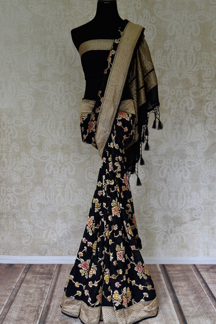 Buy black Banarasi georgette sari online in USA with floral zari work. Find a splendid collection of Indian designer sarees with blouses in USA at Pure Elegance Indian clothing store. Make a striking appearance on festive occasions by shopping from a range of pure silk saris, Banarasi sarees, embroidered saris from our online store.-full view