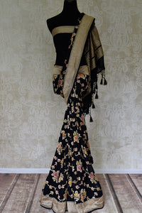 Buy black Banarasi georgette sari online in USA with floral zari work. Find a splendid collection of Indian designer sarees with blouses in USA at Pure Elegance Indian clothing store. Make a striking appearance on festive occasions by shopping from a range of pure silk saris, Banarasi sarees, embroidered saris from our online store.-full view