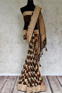 Buy brown color Benarasi georgette sari online in USA with minakari zari floral creeper design. Shine bright on special occasions with traditional Indian sarees, Banarasi sarees, pure silk sarees in rich colors and designs from Pure Elegance Indian fashion store in USA.-full view