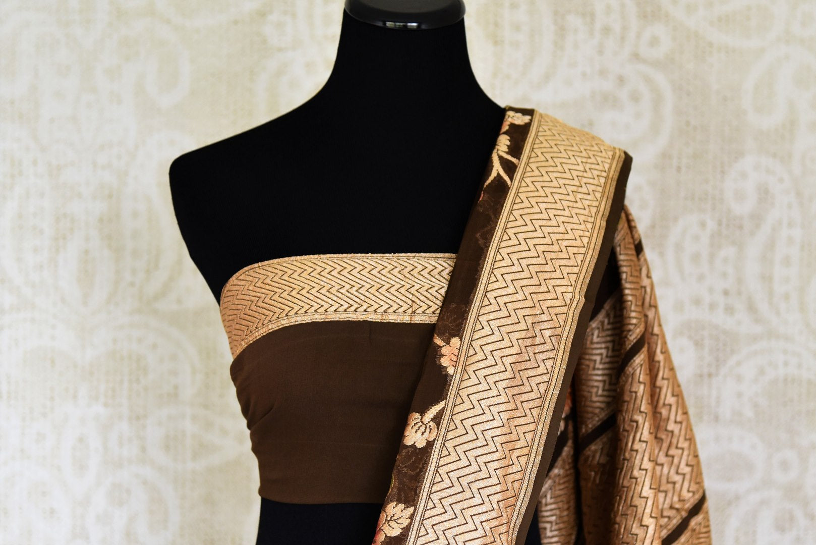 Buy dark brown Benarasi georgette saree online in USA with minakari zari floral creeper design. Shine bright on special occasions with traditional Indian sarees, Banarasi sarees, pure silk sarees in rich colors and designs from Pure Elegance Indian fashion store in USA.-blouse pallu