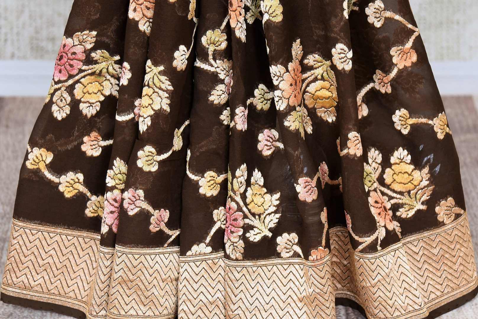 Buy dark brown Benarasi georgette saree online in USA with minakari zari floral creeper design. Shine bright on special occasions with traditional Indian sarees, Banarasi sarees, pure silk sarees in rich colors and designs from Pure Elegance Indian fashion store in USA.-pleats