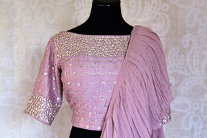 Shop onion pink tiered georgette saree with silk blouse online in USA. Shop more such Indian designer saris, embroidered sarees, pure silk sarees in USA from Pure Elegance clothing fashion store this wedding season.-blouse pallu