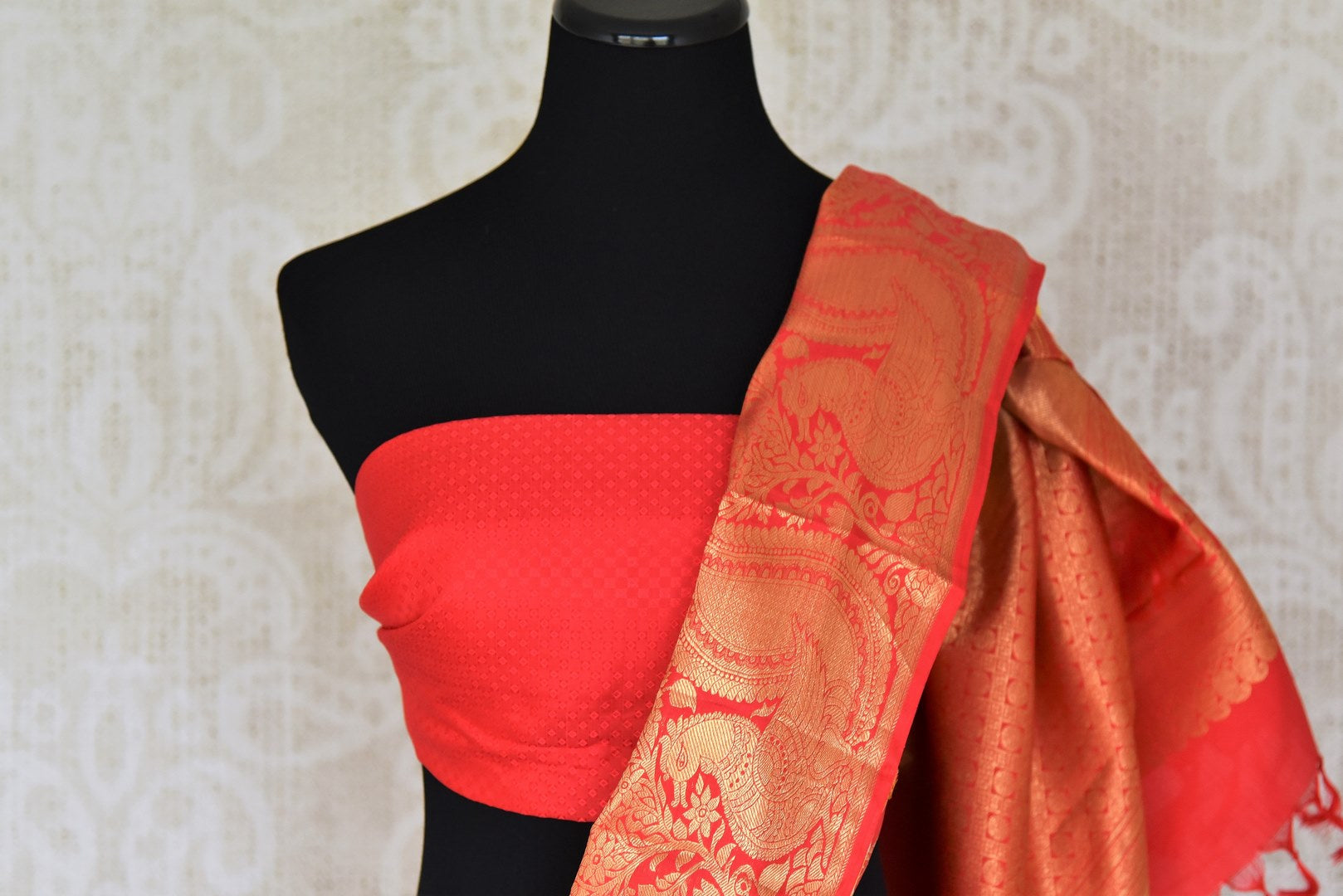 Buy yellow Kanchipuram silk sari with red zari border online in USA from Pure Elegance. Make your ethnic style perfect with a range of exquisite Indian designer saris with blouses, embroidered sarees, pure handloom sarees available at our exclusive Indian fashion store in USA and also on our online store. Shop now.-blouse pallu