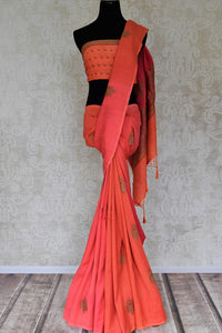 Buy pink and orange muga Benarasi sari online in USA with antique zari buta. Shine bright on special occasions with traditional Indian sarees, handloom sarees, pure silk saris in rich colors and designs from Pure Elegance Indian fashion store in USA.-full view