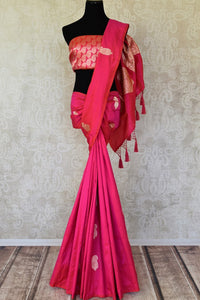 Shop bright pink Banarasi silk sari online in USA with paisley zari buta from Pure Elegance. Add exquisite traditional Banarasi saris, wedding sarees, pure silk sarees in beautiful designs to your ethnic wardrobe from our Indian clothing store in USA or shop online.-full view