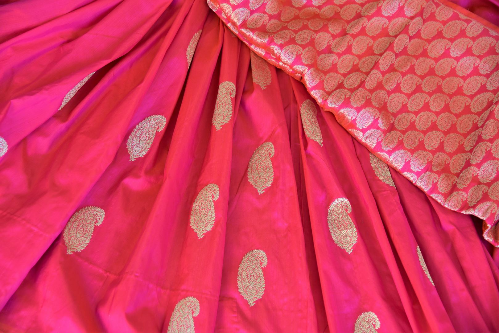 Shop bright pink Banarasi silk sari online in USA with paisley zari buta from Pure Elegance. Add exquisite traditional Banarasi saris, wedding sarees, pure silk sarees in beautiful designs to your ethnic wardrobe from our Indian clothing store in USA or shop online.-details
