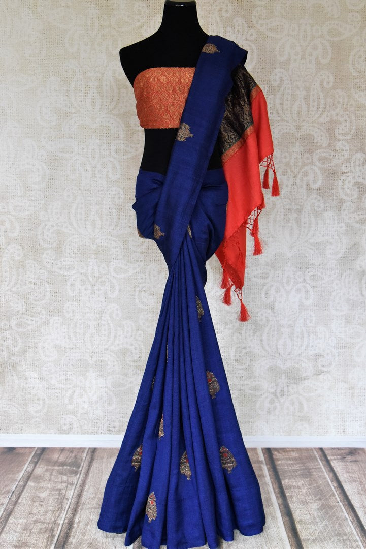 Buy blue muga silk saree online in USA with zari buta and orange zari pallu from Pure Elegance Indian clothing store in USA. Refresh your wardrobe this wedding season with an exquisite range of Indian designer sarees, traditional Banarasi saris, embroidered sarees from our store in USA or shop online.-full view