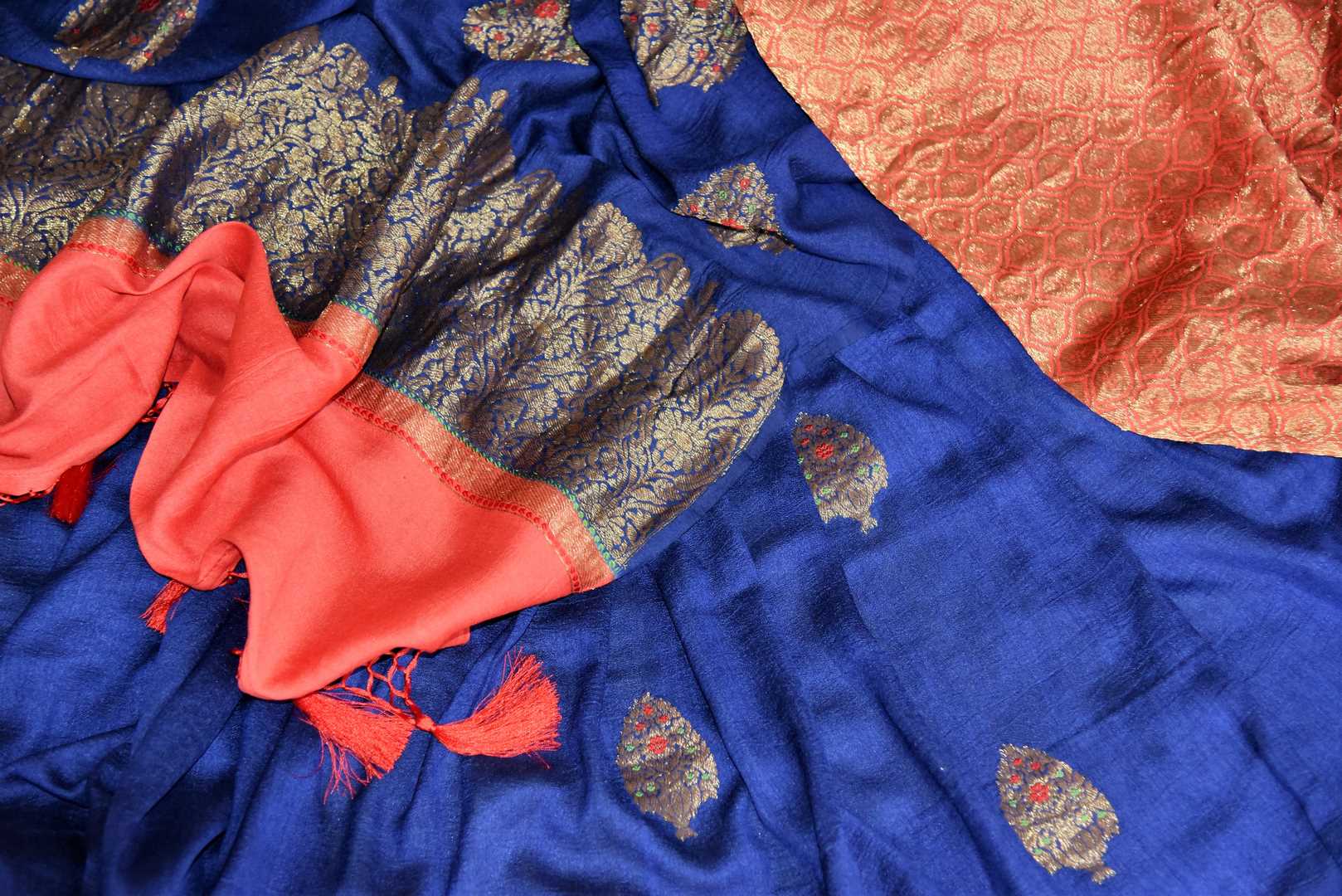 Buy blue muga silk saree online in USA with zari buta and orange zari pallu from Pure Elegance Indian clothing store in USA. Refresh your wardrobe this wedding season with an exquisite range of Indian designer sarees, traditional Banarasi saris, embroidered sarees from our store in USA or shop online.-details