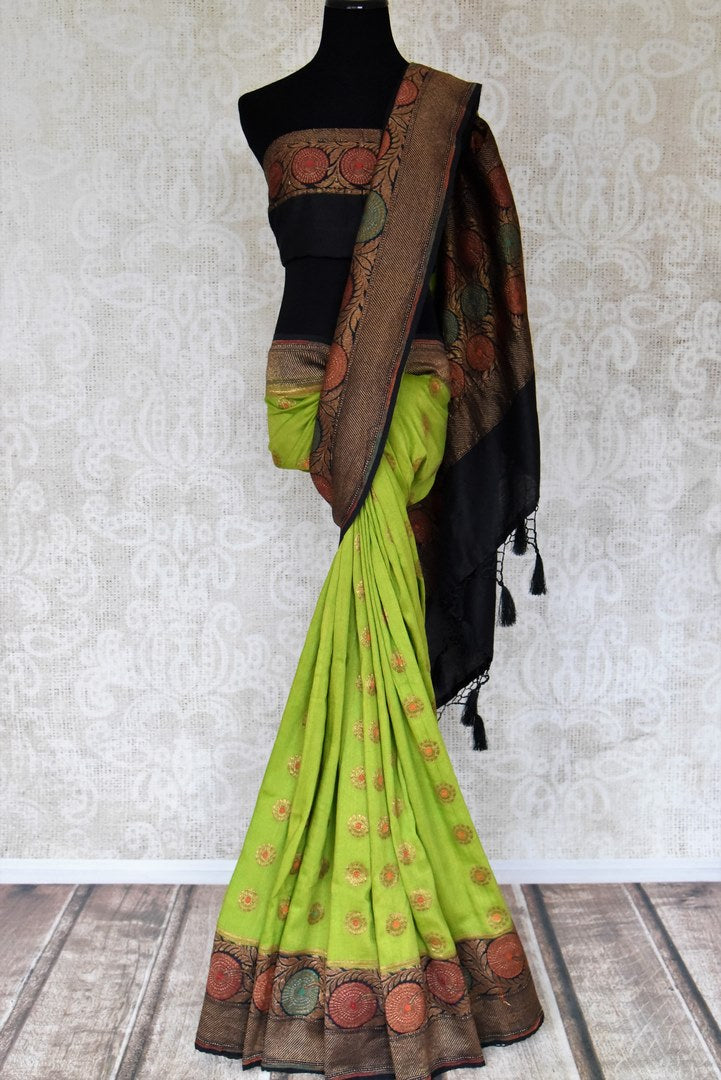 Buy green muga silk saree online in USA with zari buta and black minakari zari border. Dazzle on special occasions in ethnic wear from Pure Elegance. Explore a range of exquisite Indian designer saris, pure silk sarees, handwoven sarees at our exclusive Indian fashion store in USA.-full view