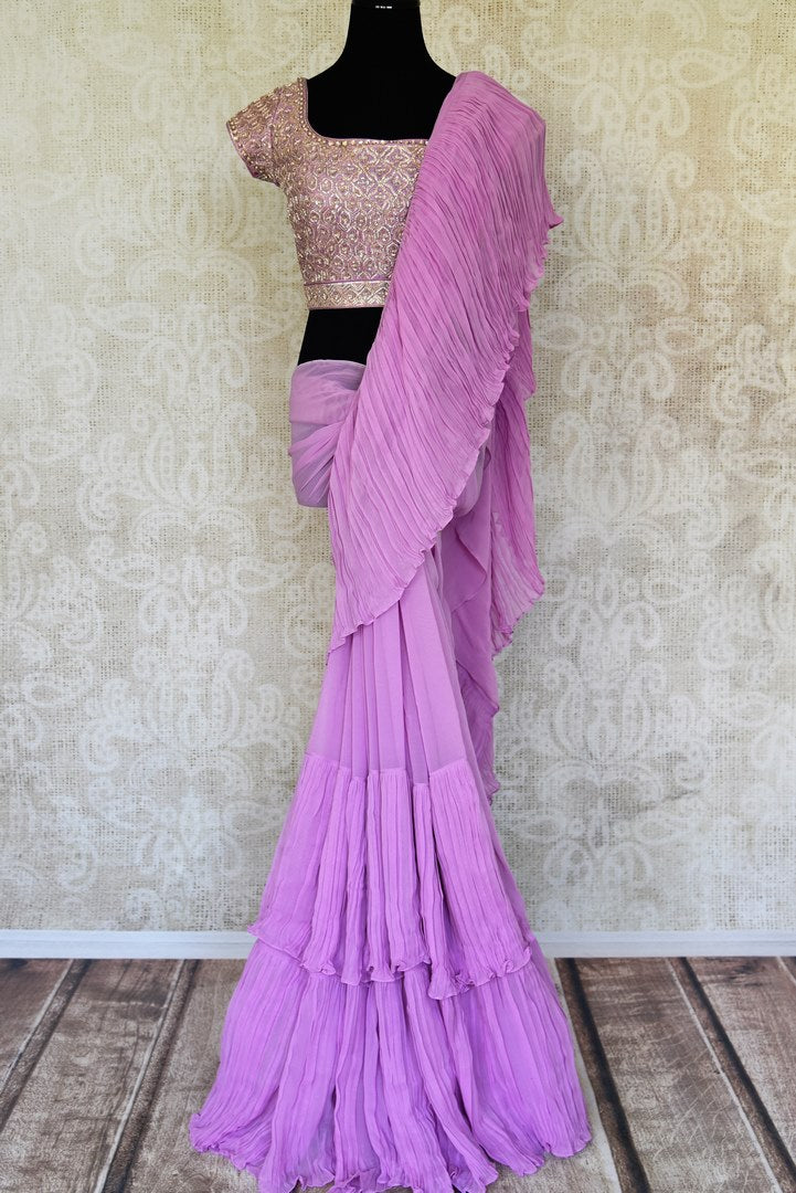 Shop mauve crinkled georgette saree with silk embroidered blouse online in USA from Pure Elegance. Make your ethnic style perfect with a range of exquisite Indian designer sarees with blouses, embroidered sarees, wedding sarees available at our exclusive Indian fashion store in USA and also on our online store. Shop now.-full view