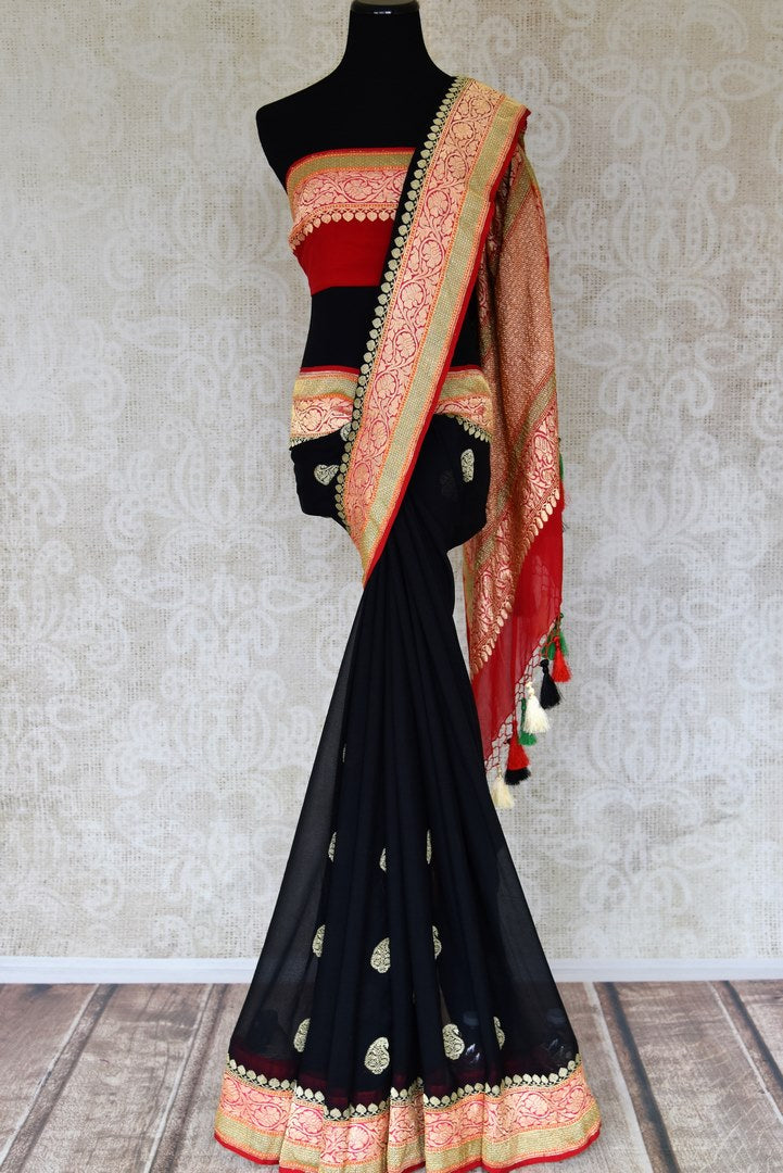 Buy black georgette Banarasi sari online in USA with paisley zari buta and multicolor zari border. Elevate your traditional saree style with beautiful Indian Banarasi saris from Pure Elegance Indian fashion store in USA. We also have a stunning variety of bridal saris for Indian brides in USA. Shop now.-full view