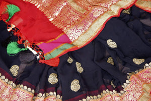Buy black georgette Banarasi sari online in USA with paisley zari buta and multicolor zari border. Elevate your traditional saree style with beautiful Indian Banarasi saris from Pure Elegance Indian fashion store in USA. We also have a stunning variety of bridal saris for Indian brides in USA. Shop now.-details