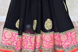Buy captivating black georgette Banarasi saree online in USA with floral zari buta and pink foliate zari border. Elevate your traditional saree style with beautiful Indian Banarasi saris from Pure Elegance Indian fashion store in USA. We also have a stunning variety of bridal saris for Indian brides in USA. Shop now.-pleats