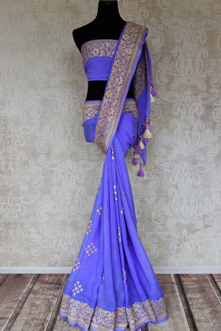 Buy mauve purple georgette Banarasi saree online in USA with silver foliate zari border. Elevate your traditional saree style with beautiful Indian Banarasi saris from Pure Elegance Indian fashion store in USA. We also have a stunning variety of bridal saris for Indian brides in USA. Shop now.-full view