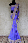 Buy mauve purple georgette Banarasi saree online in USA with silver foliate zari border. Elevate your traditional saree style with beautiful Indian Banarasi saris from Pure Elegance Indian fashion store in USA. We also have a stunning variety of bridal saris for Indian brides in USA. Shop now.-full view